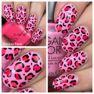 Beautiful pink manicure with leopard design. Female fingers with long round  nails and pink gel polish Stock Photo | Adobe Stock