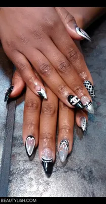 Elegant chanel-themed nail art with crystals on Craiyon