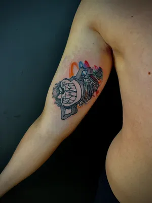 Тату мультяшная голова - фото салона Tattoo Times, узнай цену на сайте.