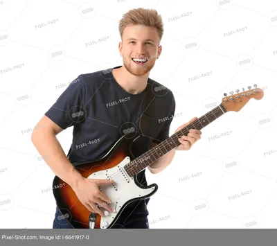 Мужчина с гитарой стоковое фото. изображение насчитывающей бело - 197156804