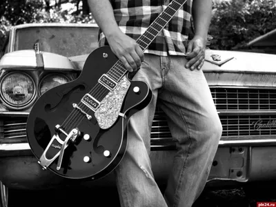 Мужчина играет на гитаре Stock Photo | Adobe Stock
