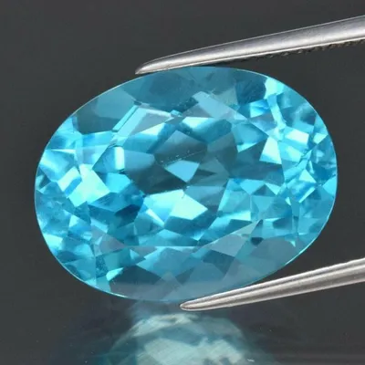 Драгоценные камни достойные Вас — Небесно-голубой топаз (оттенок Sky blue)  из Нигерии огранка в Баснословно принцесса-фантазия 11,1×10,97мм 8,98 карат  — где купить, цены на драгоценные
