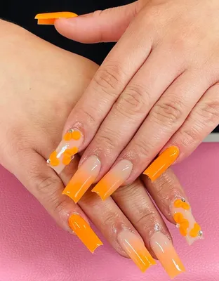 The Prettiest Summer Nail Designs We've Saved : Shimmery ombre orange nails