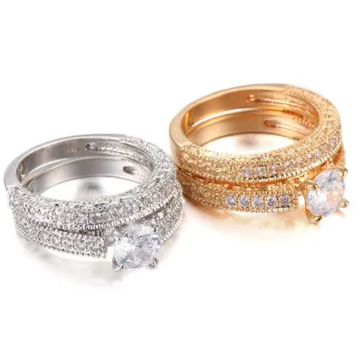 ᐉ Серебряное двойное кольцо с позолотой как обручальное кольцо з большим  цирконом купить по доступной цене (арт. 959463206)