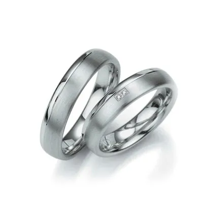 Классические свадебные кольца с бриллиантами на заказ из белого и желтого  золота, серебра, платины или своего металла