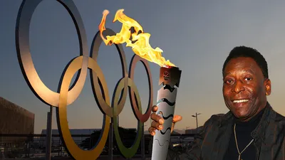 Олимпийский огонь у стен МГУ