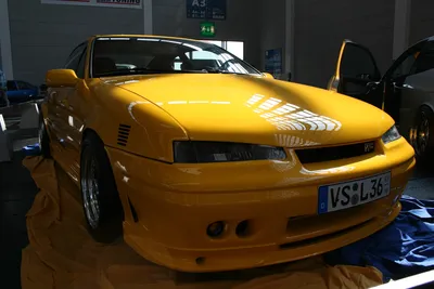 Warsaw International Motor Show 2005 Opel Calibra after tuning Stock Photo  - Alamy