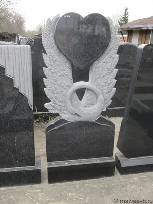 Памятники на могилу с птицами голубем и лебедем изготовление установка  Волгоград - Гранит Волга