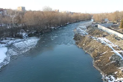 Река Терек на фоне заснеженных …» — создано в Шедевруме