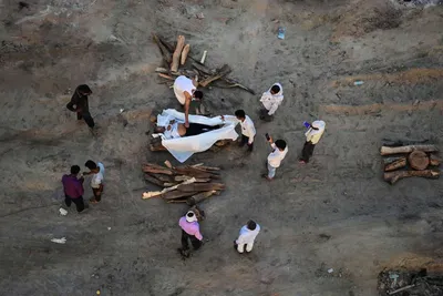В Индии из реки Ганг выловили тела 96 человек - РИА Новости, 12.05.2021