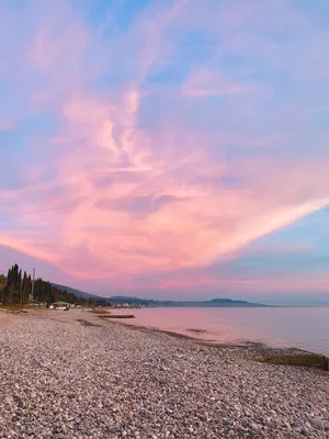 Розовый закат над морем стоковое изображение. изображение насчитывающей  величественно - 190936271