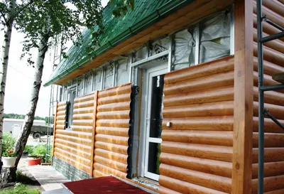 Обшивка деревянного дома сайдингом в Минске.