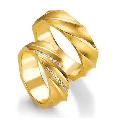 Оригинальные обручальные кольца из белого и желтого золота с бриллиантами  на заказ