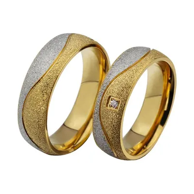 Золотые широкие обручальные кольца необычной формы 412918 : купить в Киеве.  Цена в интернет-магазине SkyGold