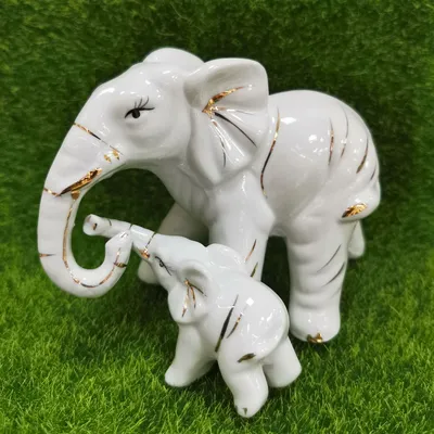 Слон с попоной коричневый h 9*13.5 см купить статуэтку из Индии