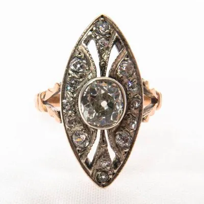 Золотое кольцо с бриллиантами и изумрудом 7,66 карата