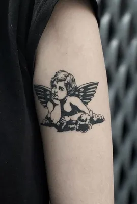 Тату на спину для мужчин ангел: идеи, стилі і значення - tattopic.ru