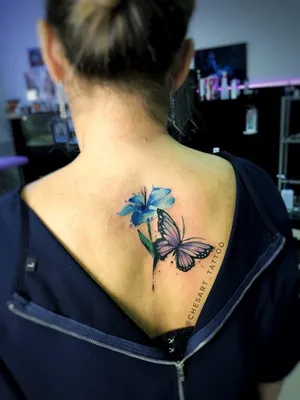 Татуировка бабочки на шее у девушки: красота и символика - tattopic.ru