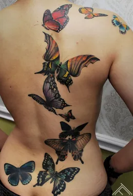 Татуировка бабочки на шее у девушки: красота и символика - tattopic.ru