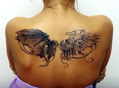 фото мужской татуировки на руке в стиле реализм графика крыло оперение  крылья перо / Тату салон «Дом Элит Тату»
