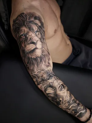 Фото тату лев с оскалом на плече сделать в тату салоне в Москве по низкой  цене