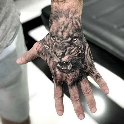 Тату лев на руке для мужчин: символ силы и мужества - fotovam.ru