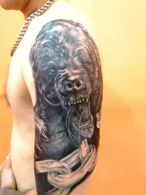 Медвежьи татуировки на плече: символ силы и мужества - tattopic.ru