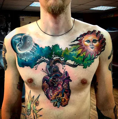 Мужские татуировки крылья на груди – символ свободы и духовности -  tattopic.ru
