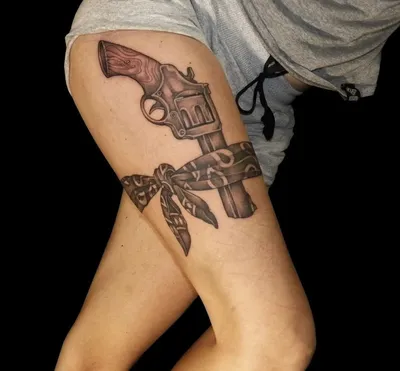 What does a gun tattoo mean? — All about tattoo