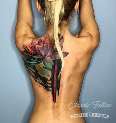 Татуировка на спине у девушки - цветы — KissMyTattoo.ru