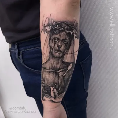 фото женской татуировки на руке в стиле фентези графика хоррор портрет  юноши со стрелой / Тату салон «Дом Элит Тату»