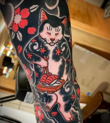 Значение татуировки кошка - история, смысл и примеры