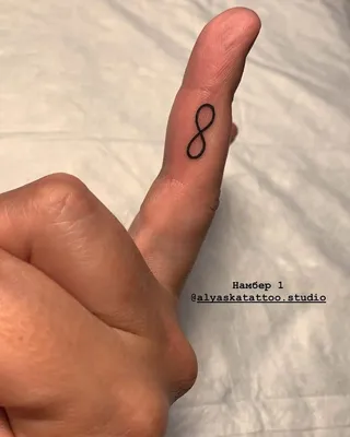 Tattoo uploaded by Вадим • Татуировка-дракон. Дракон в виде знака  бесконечности, был сделан одним сеансом за 2 часа. Место нанесения - спина,  по линии позвоночника, между лопаток. www.evotattoo.ru. #tattoo #tattooed  #dragon #tattoo_dragon #