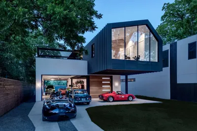 DT0499 – проект красивого дома с мансардой и балконом над гаражом