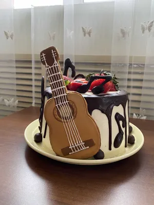Торт в виде гитары с бантом №152312 заказать с доставкой