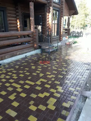 Тротуарная плитка во дворе частного дома фотo