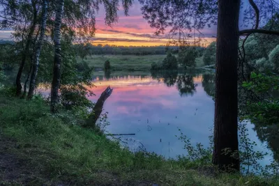 Красочный закат на берегу озера. Фотограф Мартыненко Дмитрий