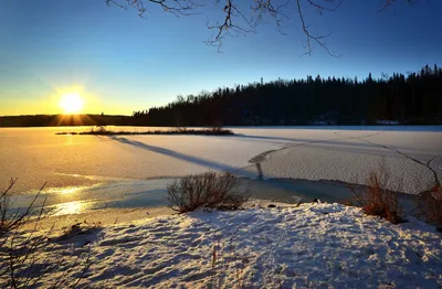 Заход солнца над озером леса зимы Стоковое Фото - изображение насчитывающей  волшебство, померанцово: 34622674