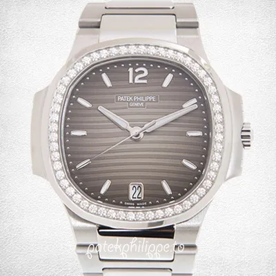 Patek Philippe Nautilus 32 мм Женские часы 7118/1200A-011 Безель с  бриллиантами