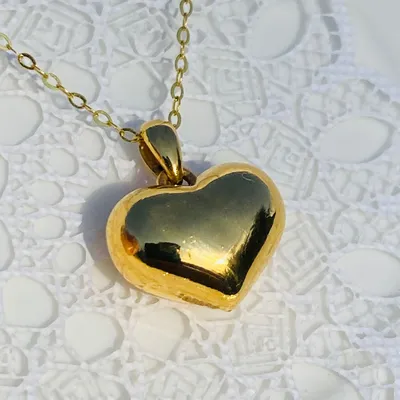 Красивый золотой кулон сердце океана…» — создано в Шедевруме